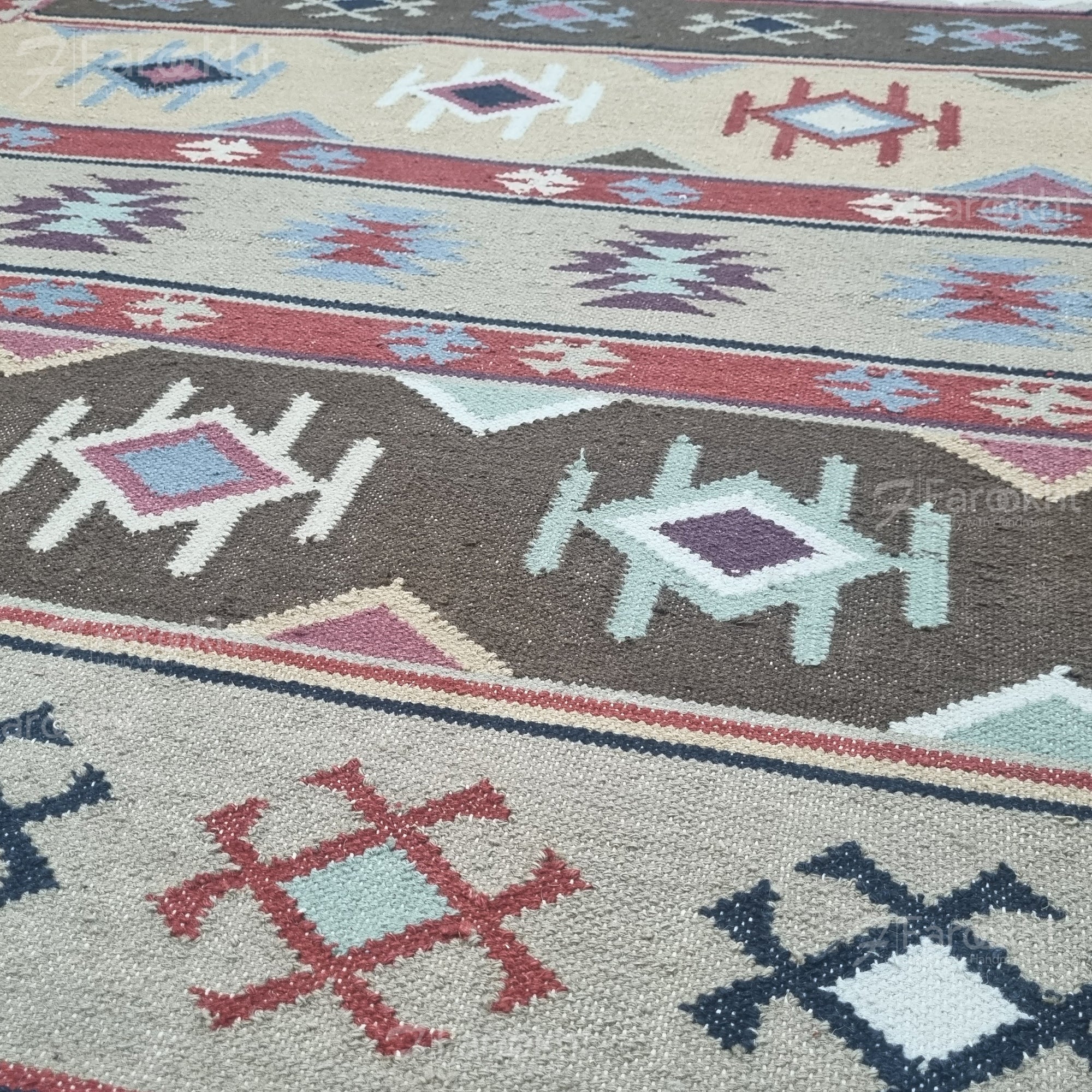 Handwoven Rust Beige Geometric wool-blend rug with teal and purple accents, fringe edges and tribal pattern. Available in multiple sizes for all living spaces
