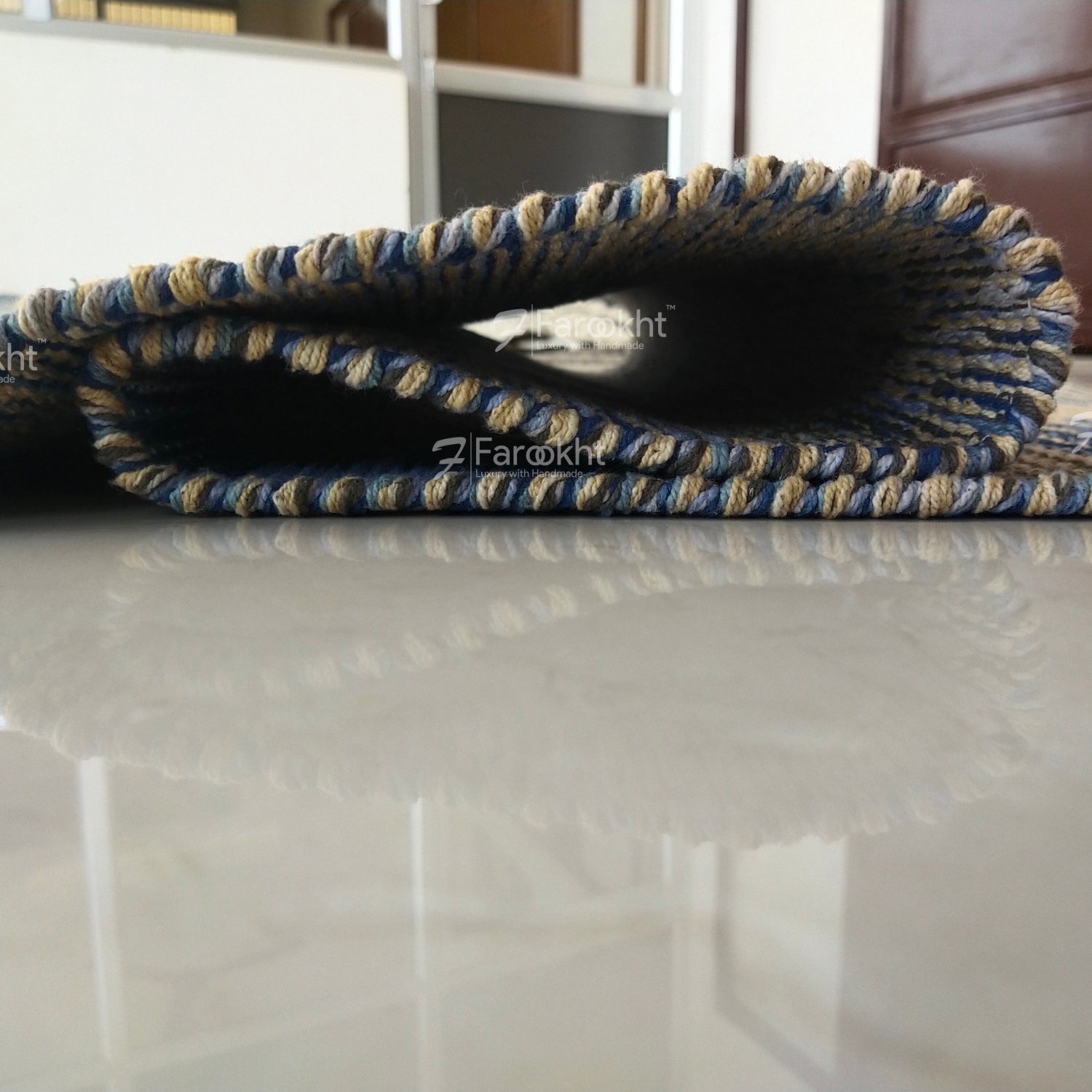 Close-up of a textured rug with &