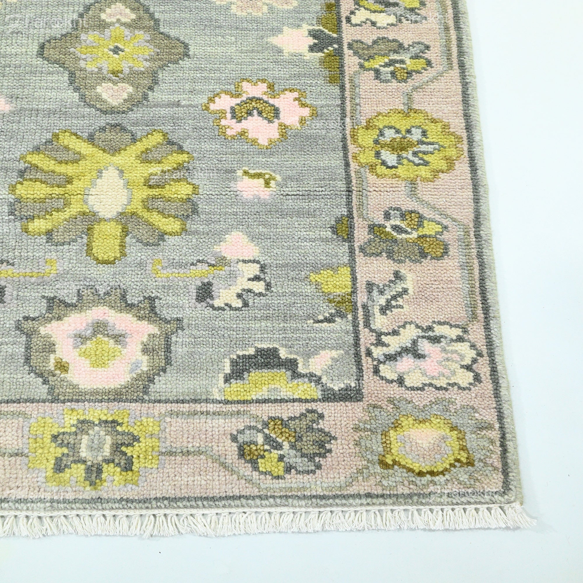 Decorative rug with floral patterns on a light blue background