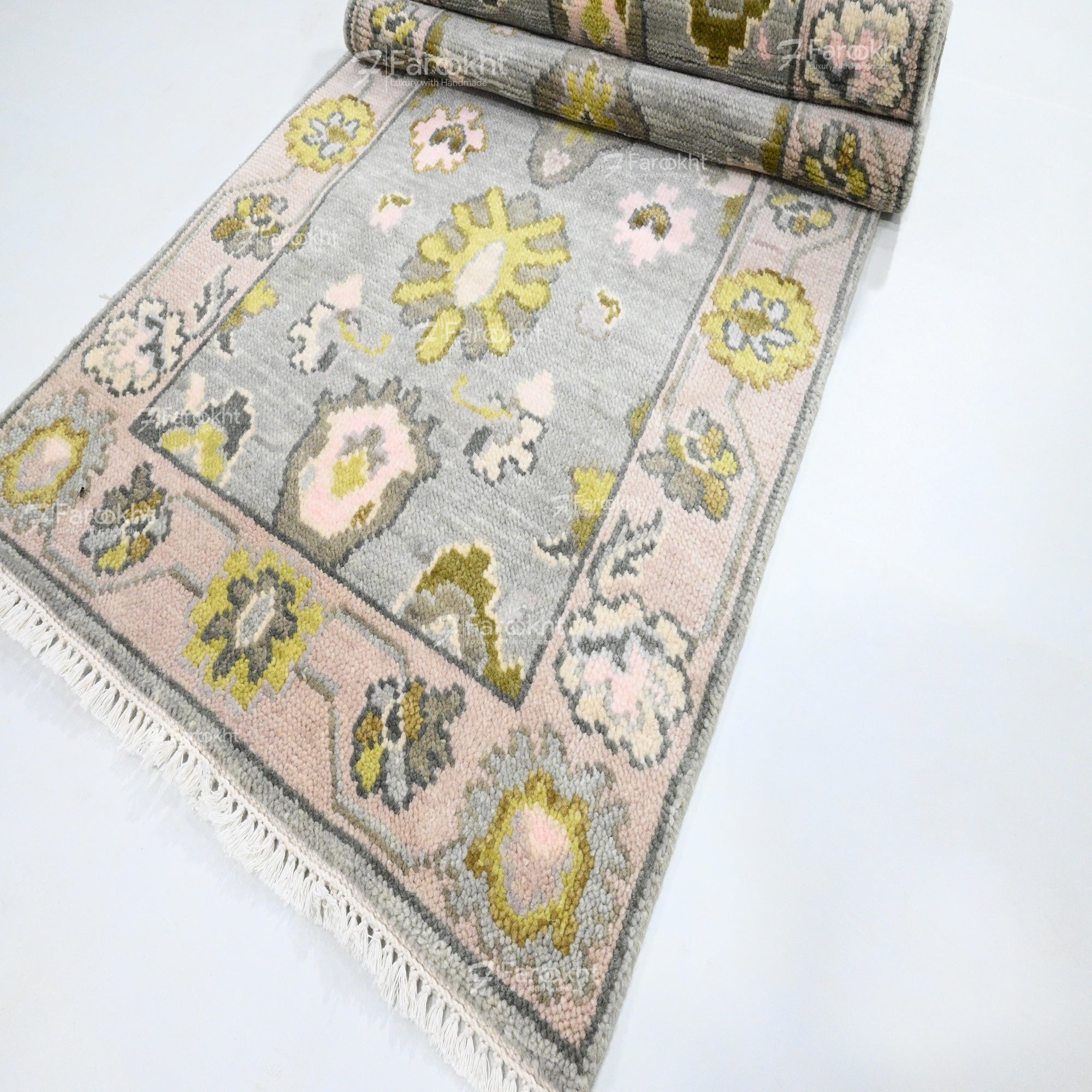 Floral patterned rug on a white background