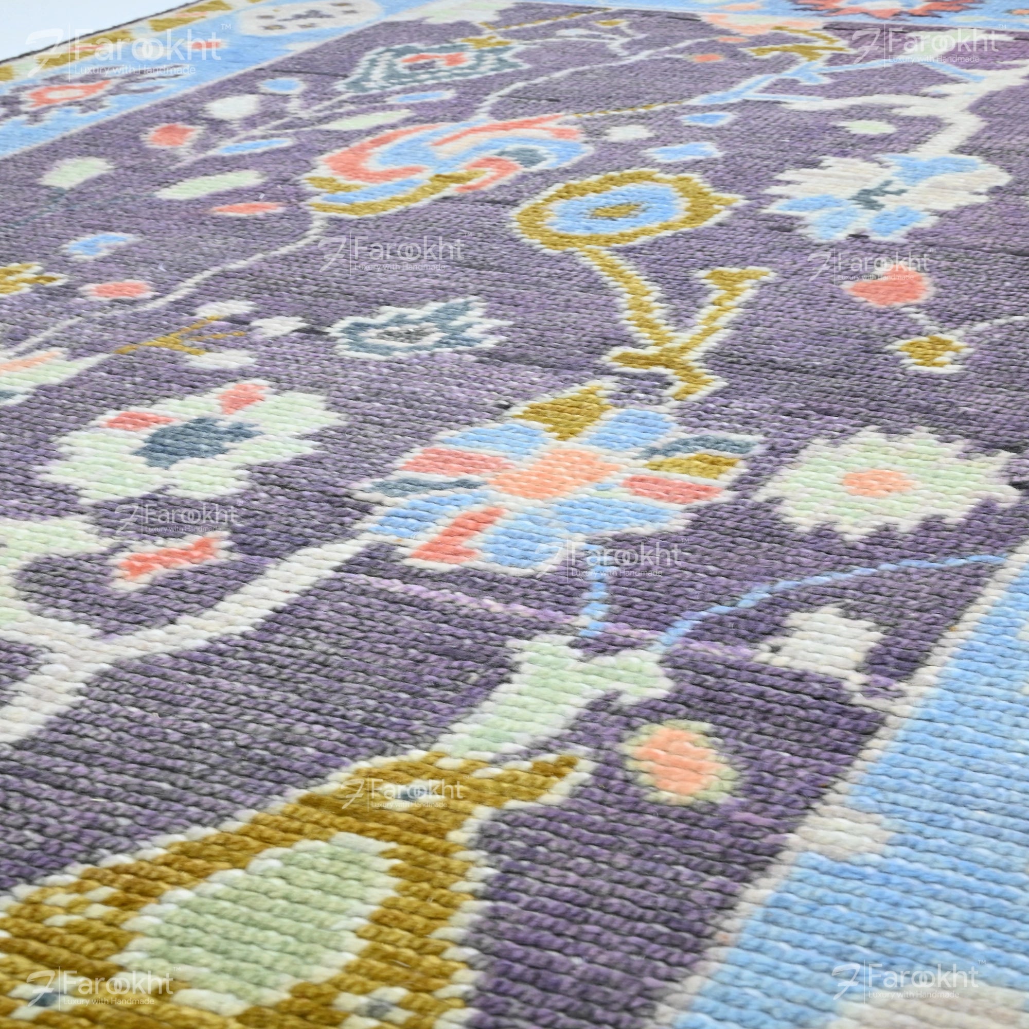 Close-up of a colorful floral patterned rug with a giraffe design.