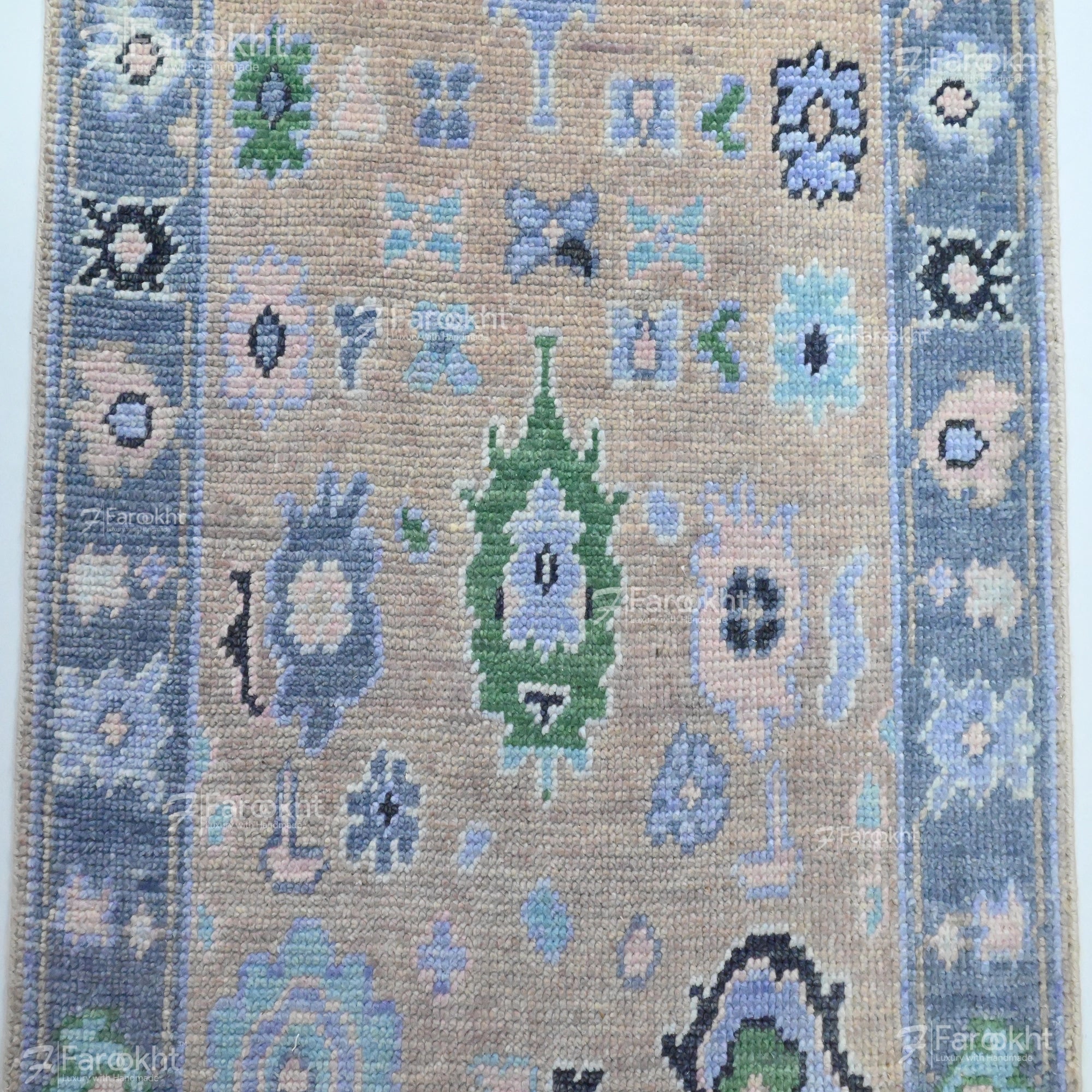Decorative rug with geometric pattern on a plain background
