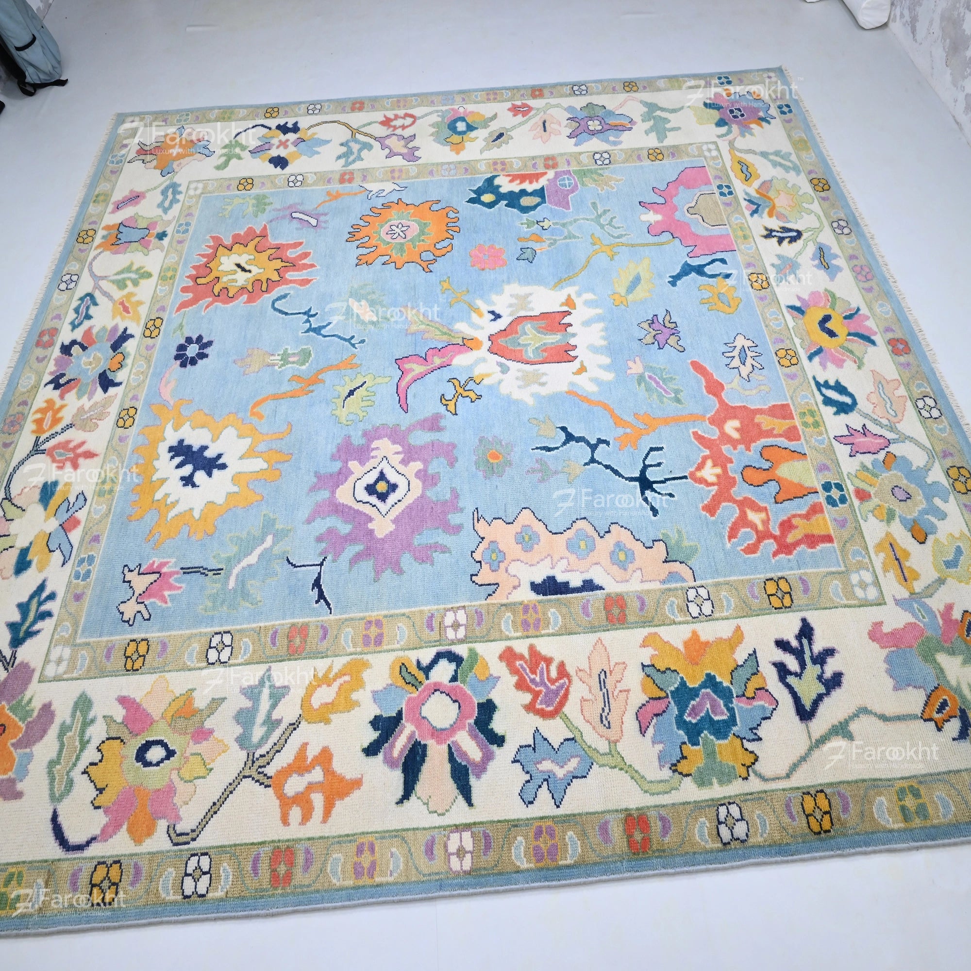 Colorful floral-patterned rug on a white floor