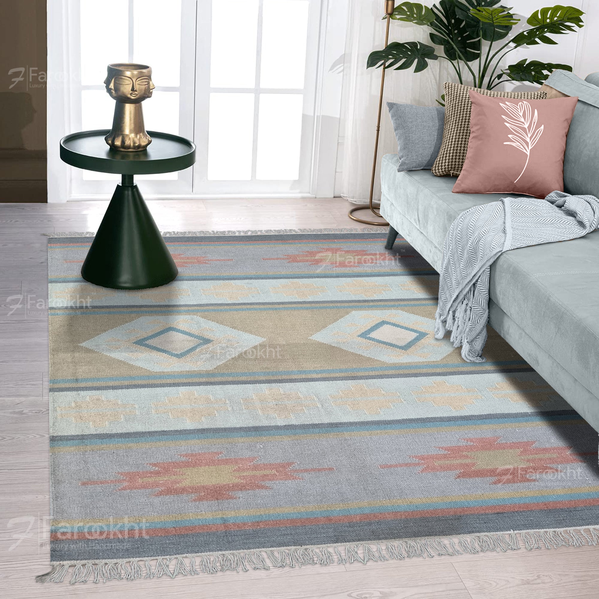 Close-up of Pastel Flatweave pattern on handwoven wool blend rug showing flatweave texture and muted tonal colors.