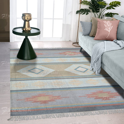 Close-up of Pastel Flatweave pattern on handwoven wool blend rug showing flatweave texture and muted tonal colors.