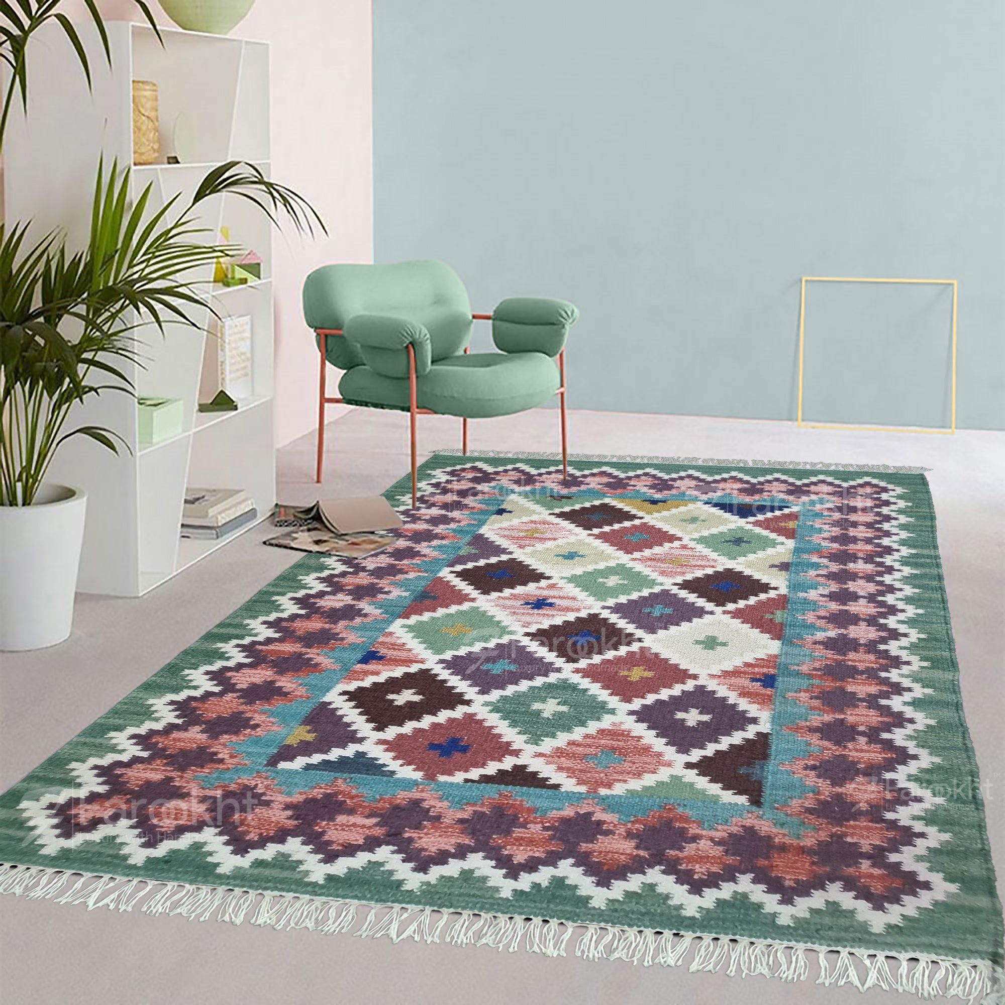 Decorative rug with geometric pattern in a room with a green chair and white shelves.