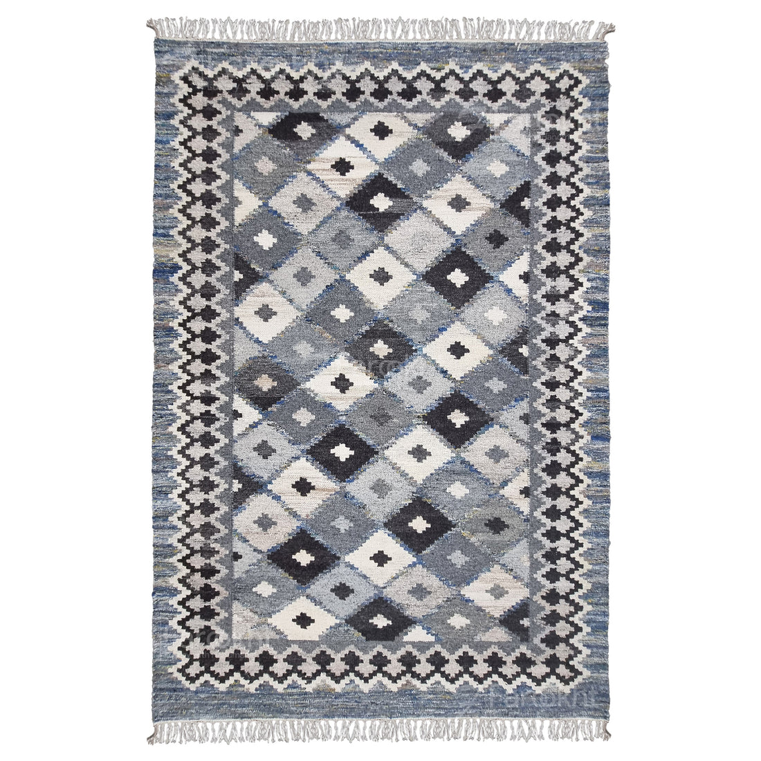 Patterned rug with geometric design on a white background