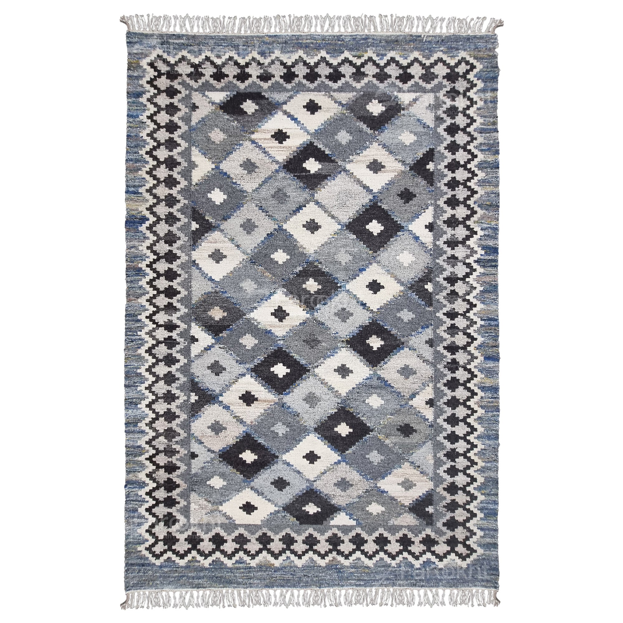 Patterned rug with geometric design on a white background