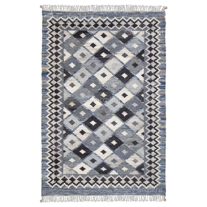 Patterned rug with geometric design on a white background