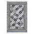 Patterned rug with geometric design on a white background