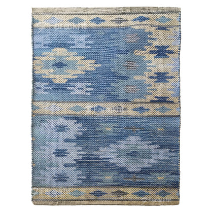 Blue patterned rug on a white background