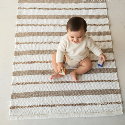 Striped rug with brown and beige stripes on a light gray background