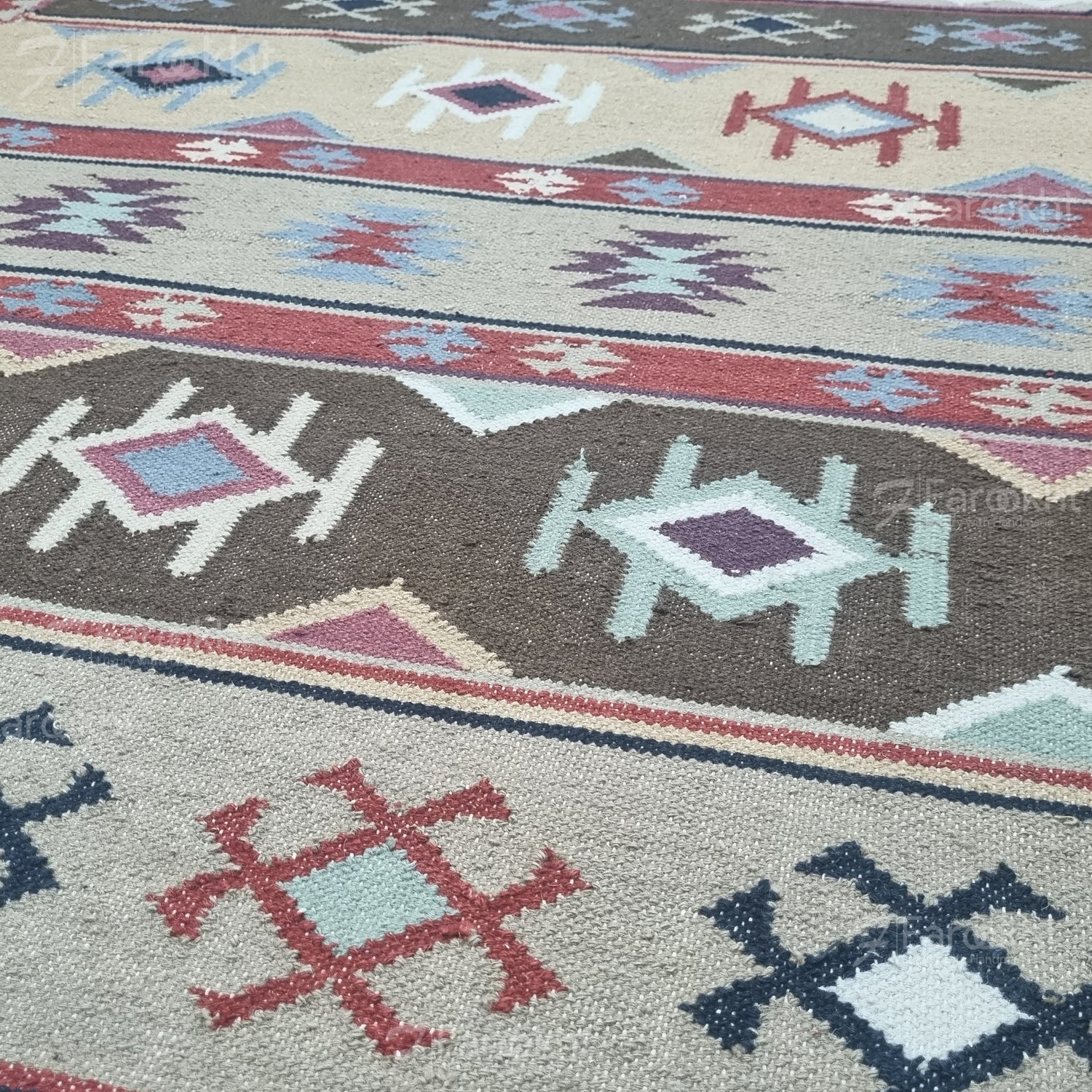 Handwoven Rust Beige Geometric wool-blend rug with teal and purple accents, fringe edges and tribal pattern. Available in multiple sizes for all living spaces