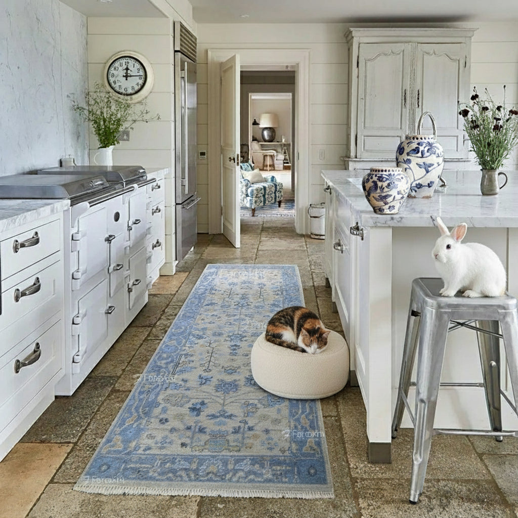 Kitchen with a blue patterned rug on the floor