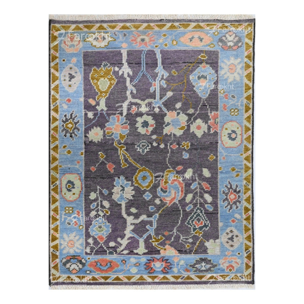 Luxury floral hand-knotted wool rug with pastel blue and gray color palette
