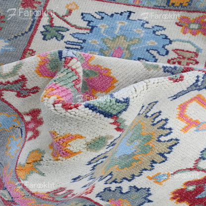 Close-up of a colorful floral-patterned rug with &