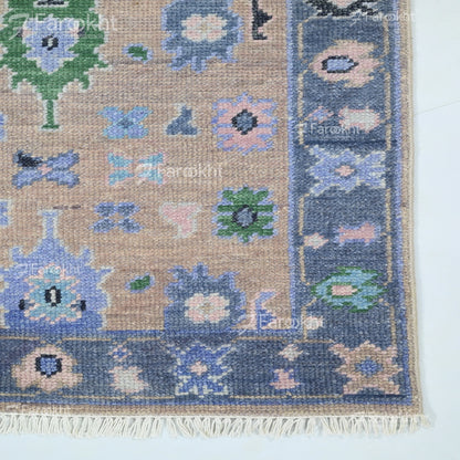 Decorative rug with floral patterns on a beige and blue background