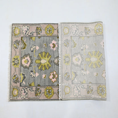 Two floral-patterned rugs on a white background
