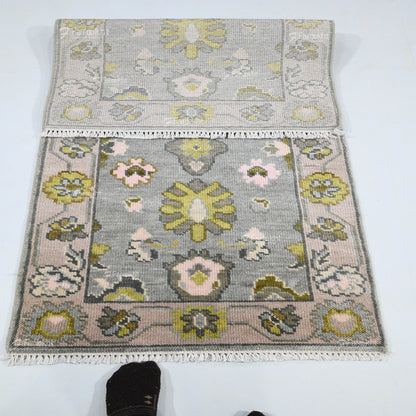 Floral patterned rug on a white background