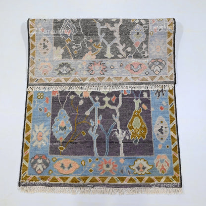 Traditional floral wool blend area rug with blue and gray tones handmade for modern homes