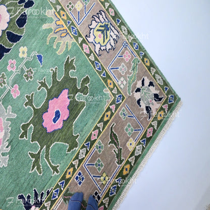 Decorative rug with intricate patterns on a white background
