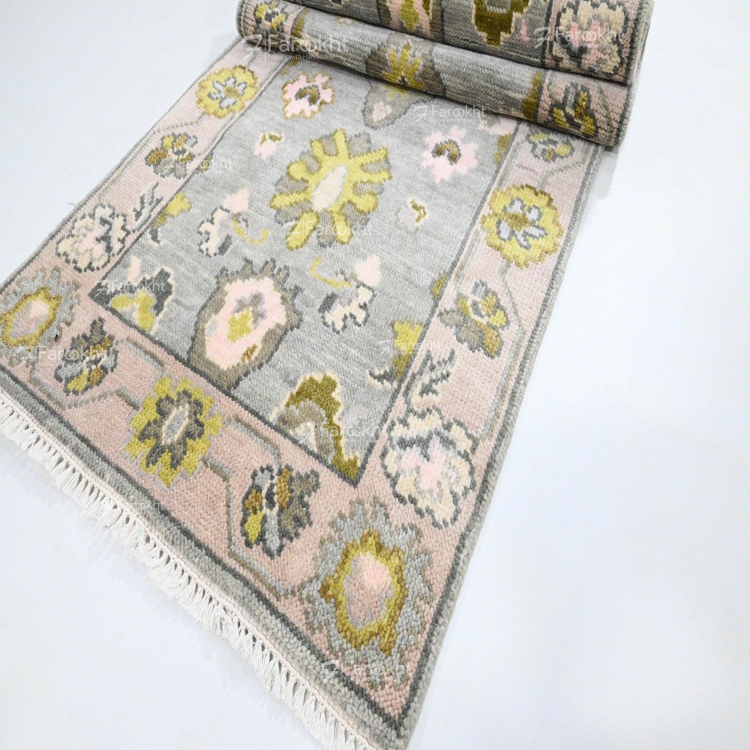 Floral patterned rug on a white background