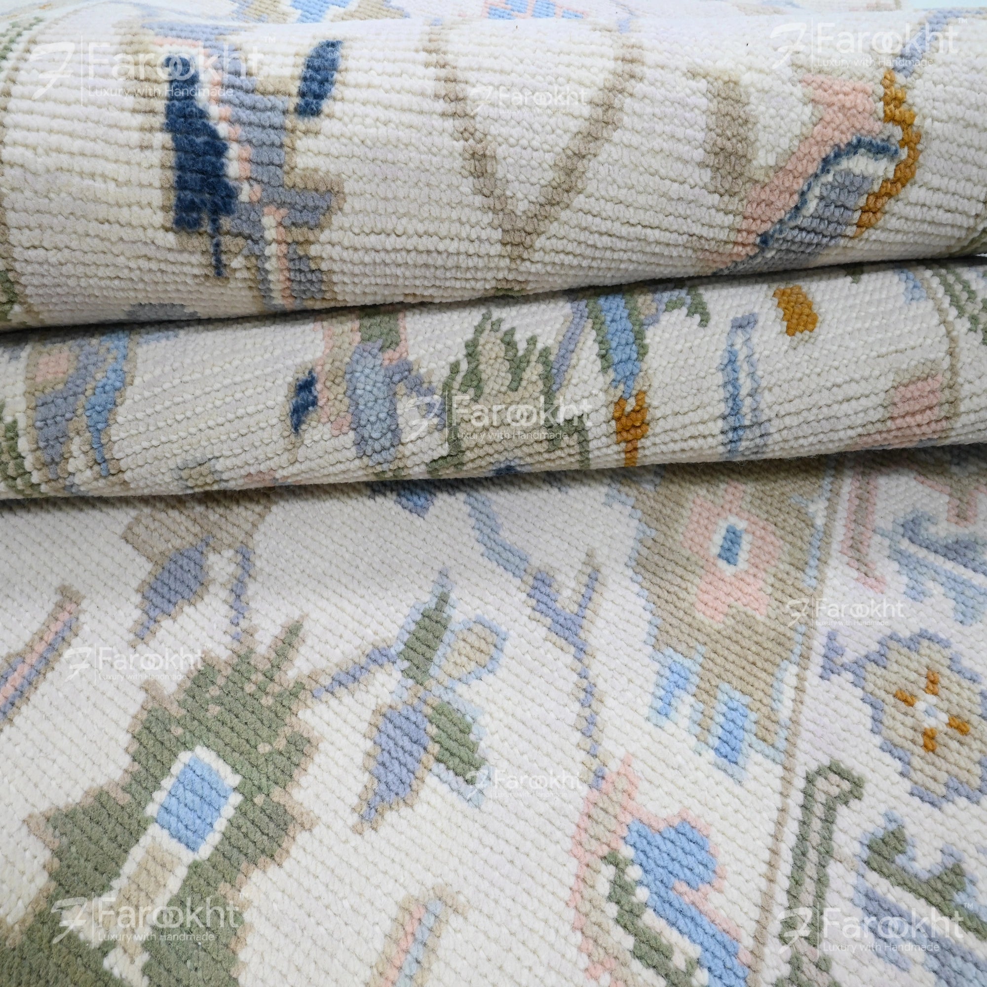 Ivory hand-knotted hallway runner rug with sky blue, blush pink, sage green, and lavender floral motifs on wool blend.