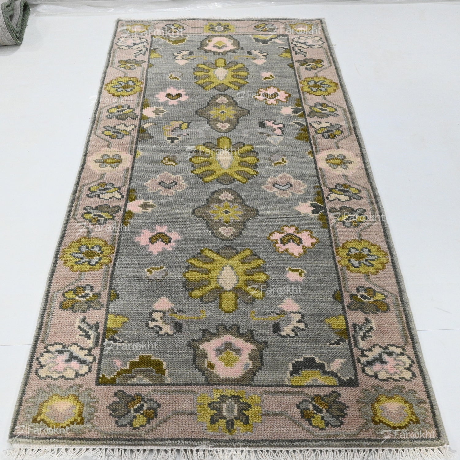 Decorative rug with floral patterns on a white background