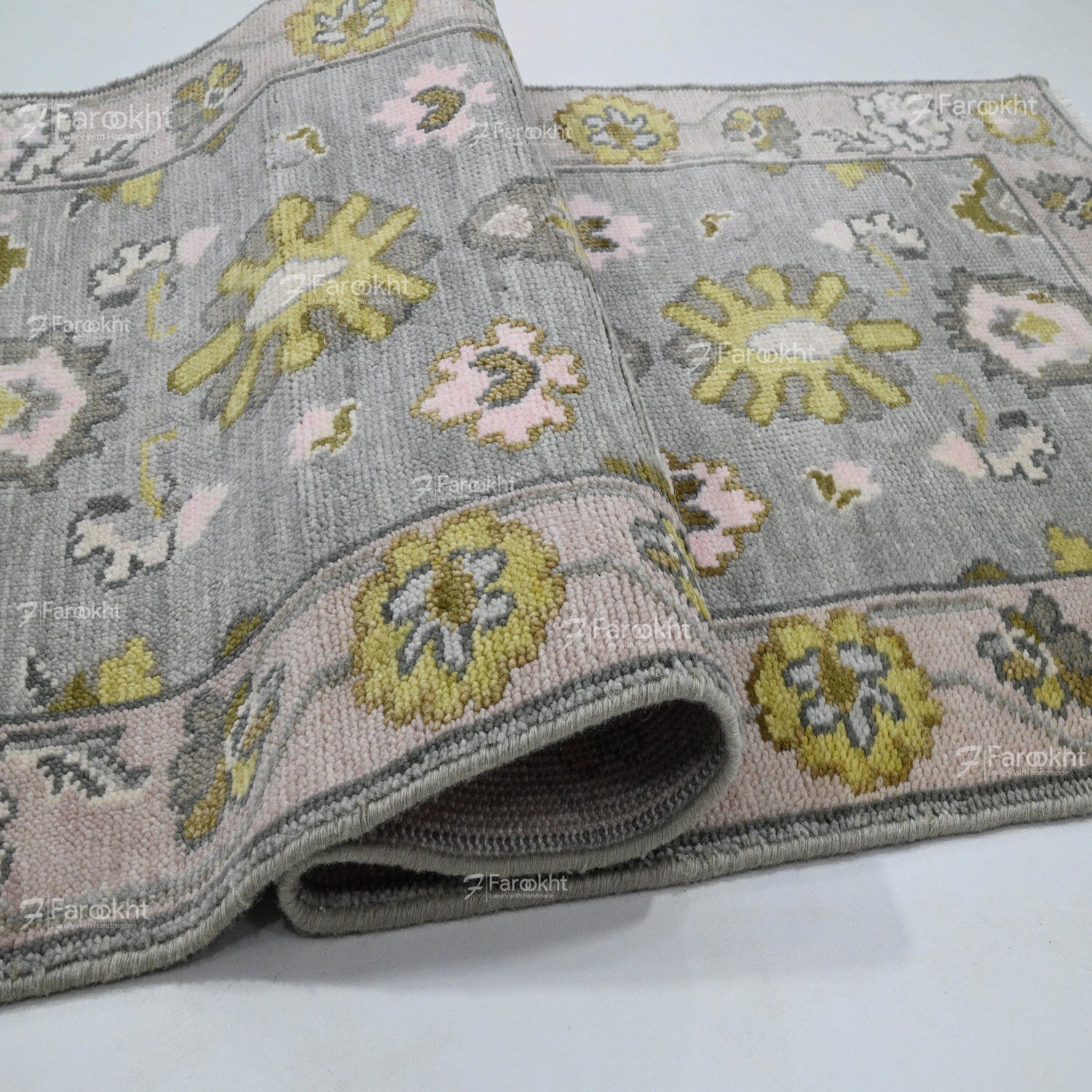 Floral patterned rug on a white background