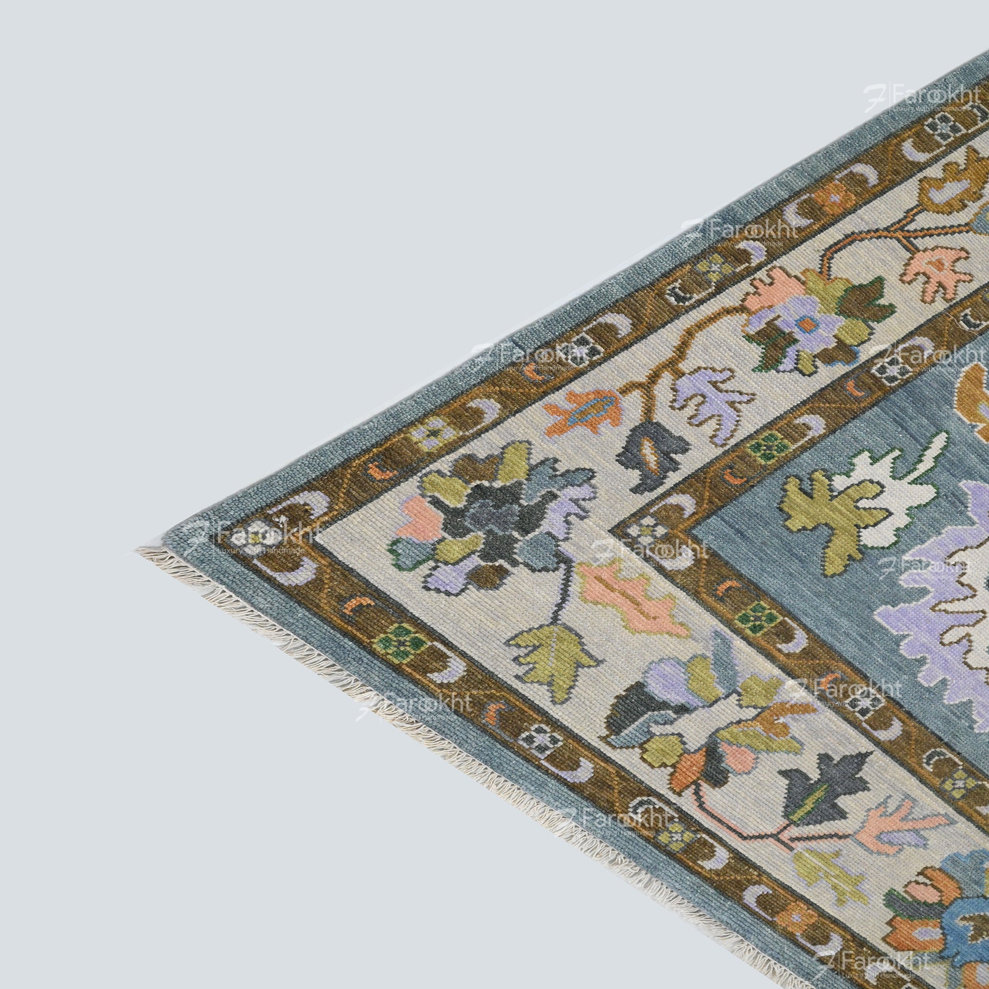 Decorative rug with floral patterns on a light gray background