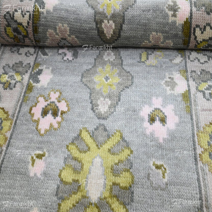 Close-up of a floral-patterned fabric with visible branding.