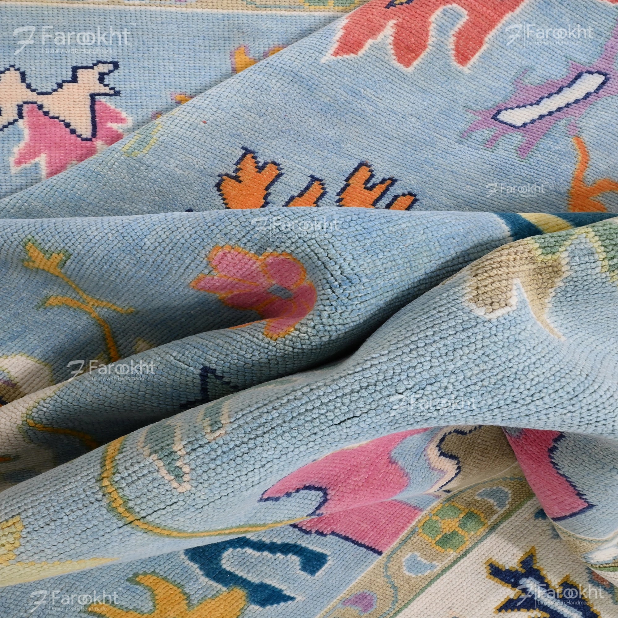 Close-up of a colorful patterned fabric with floral designs.