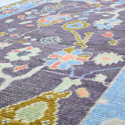 Close-up of a colorful floral patterned rug with a giraffe design.