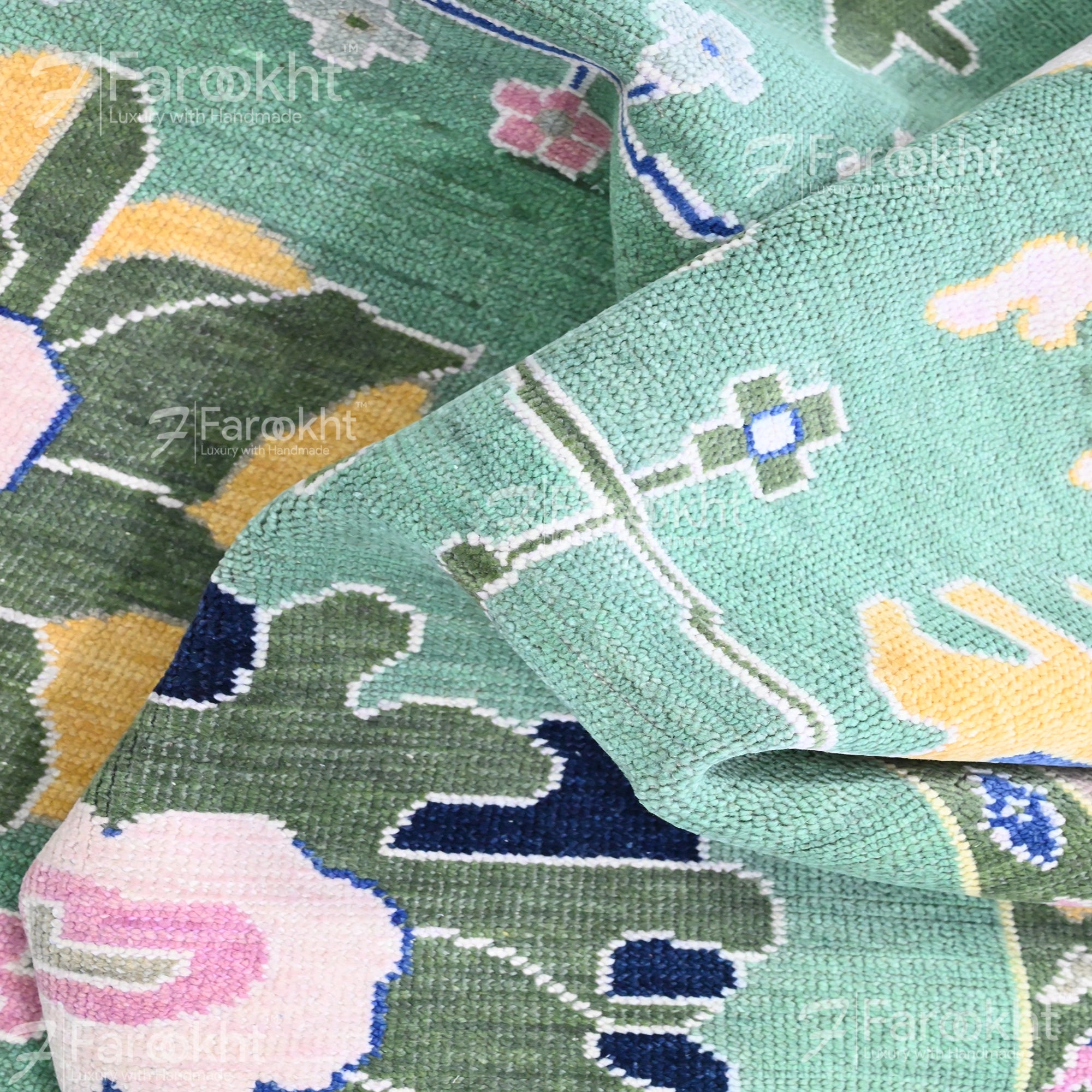 Close-up of a patterned fabric with floral and geometric designs.