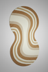 Rug with wavy brown and beige pattern on a plain background