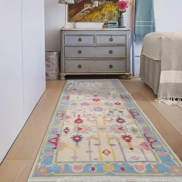 Traditional hallway rug in cream with soft pink and mint green