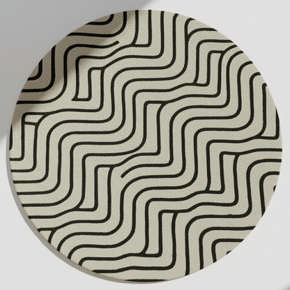 Round beige rug with black wavy geometric lines